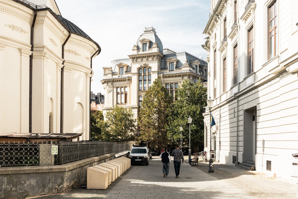 Charming street scene in Bucharest Romania old town with historic buildings and outdoor cafes