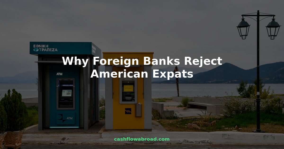 American expat at foreign ATM machine by the sea - FATCA causes banks to reject US clients