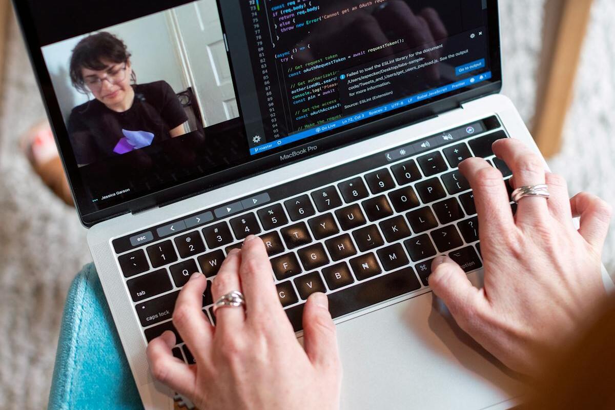 Solo founder working on laptop building AI micro-SaaS product remotely