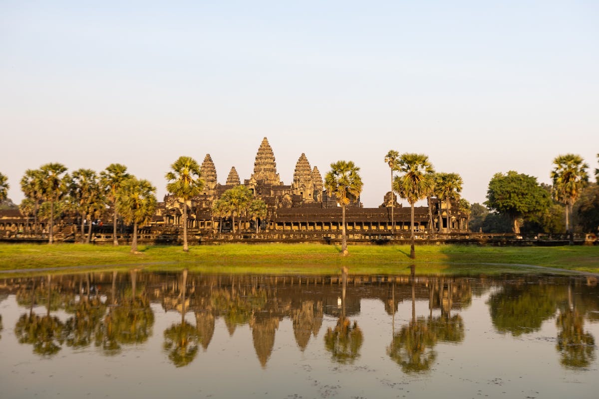 Angkor Wat temple complex reflected in water, Cambodia