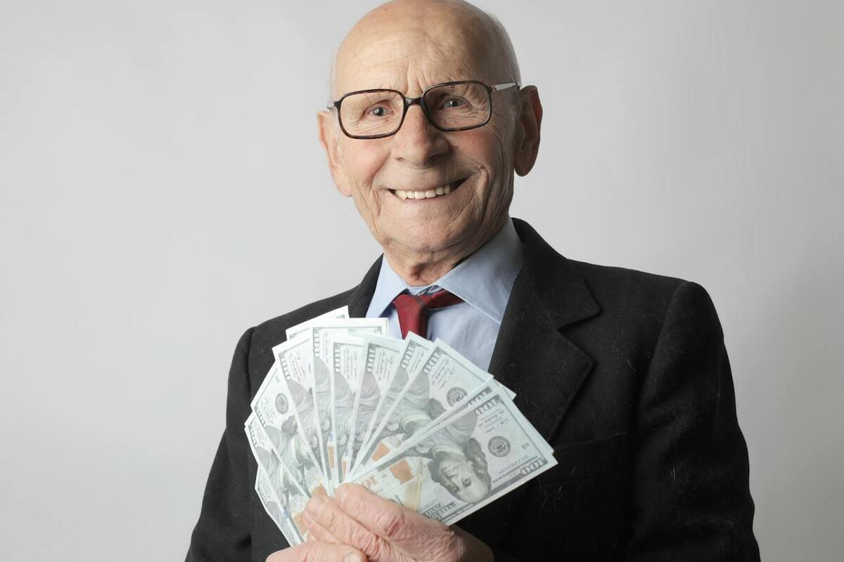 Senior retiree reviewing financial documents representing restored Social Security benefits after WEP GPO repeal