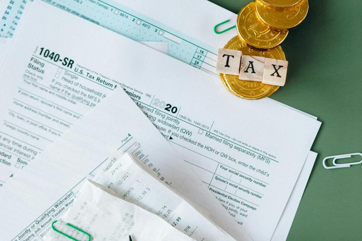 Tax documents and financial paperwork for expat residency planning