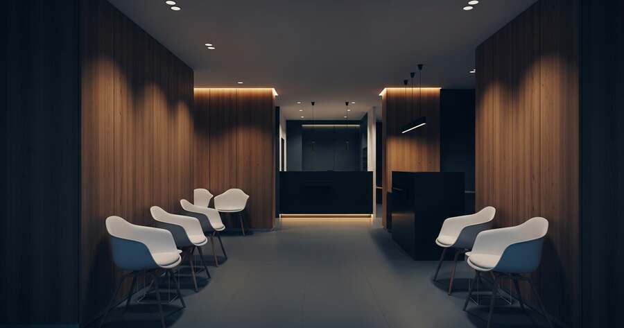 modern clinic reception area warm wood panels white chairs