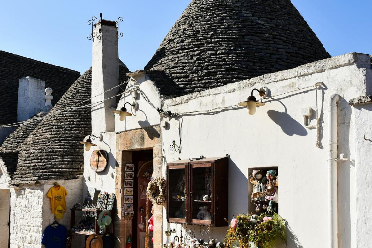 Trulli stone houses in Alberobello, Puglia — one of Italy's qualifying regions for the 7% flat tax retirement program