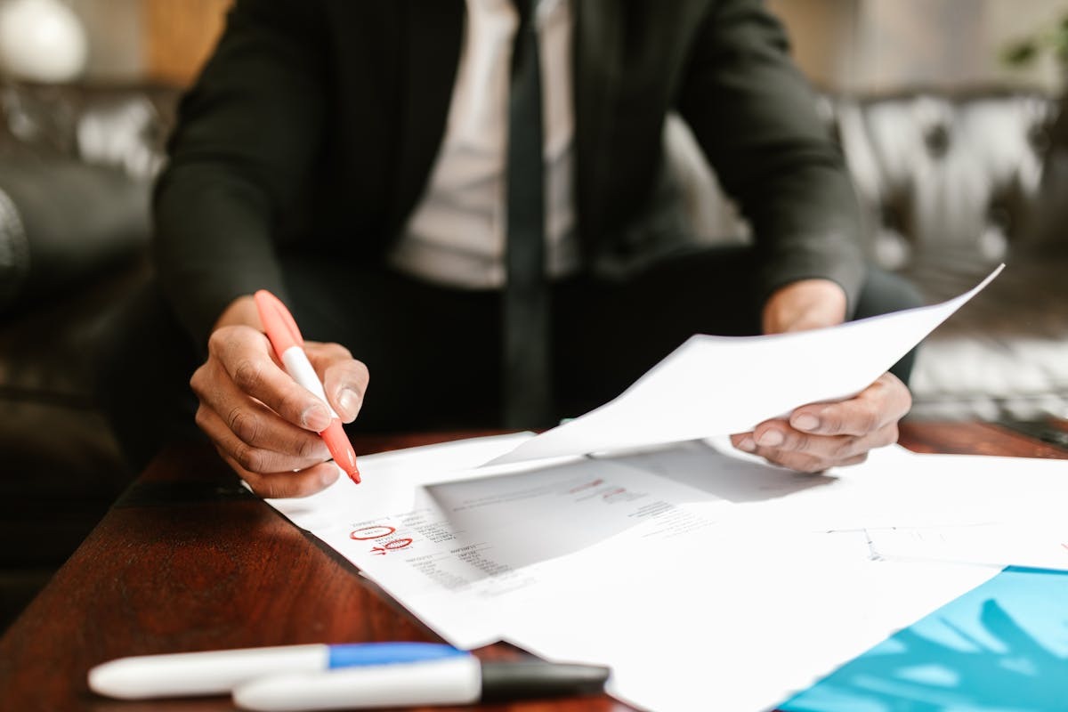 Business professional reviewing international tax and financial documents