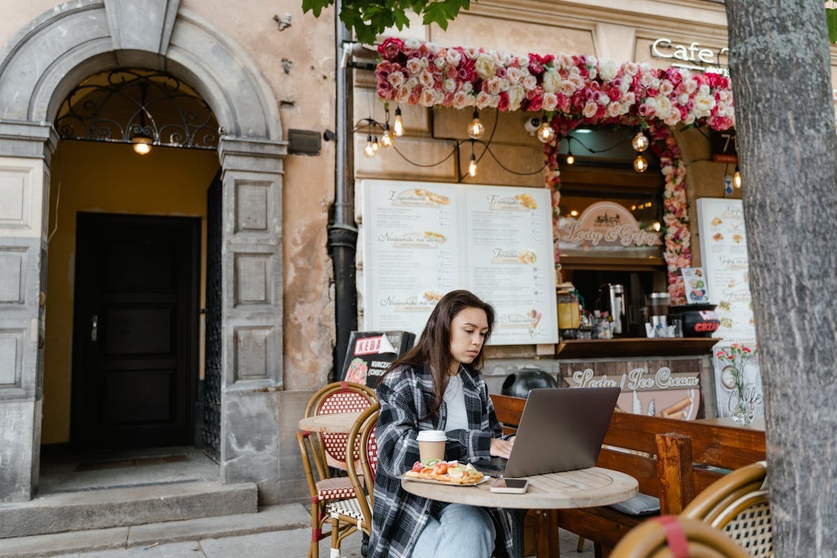 Digital nomad working at a cafe in Spain